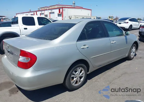 2004 Toyota Camry Le V6 z USA, uszkodzony, nr VIN 4T1BF32K24U066485